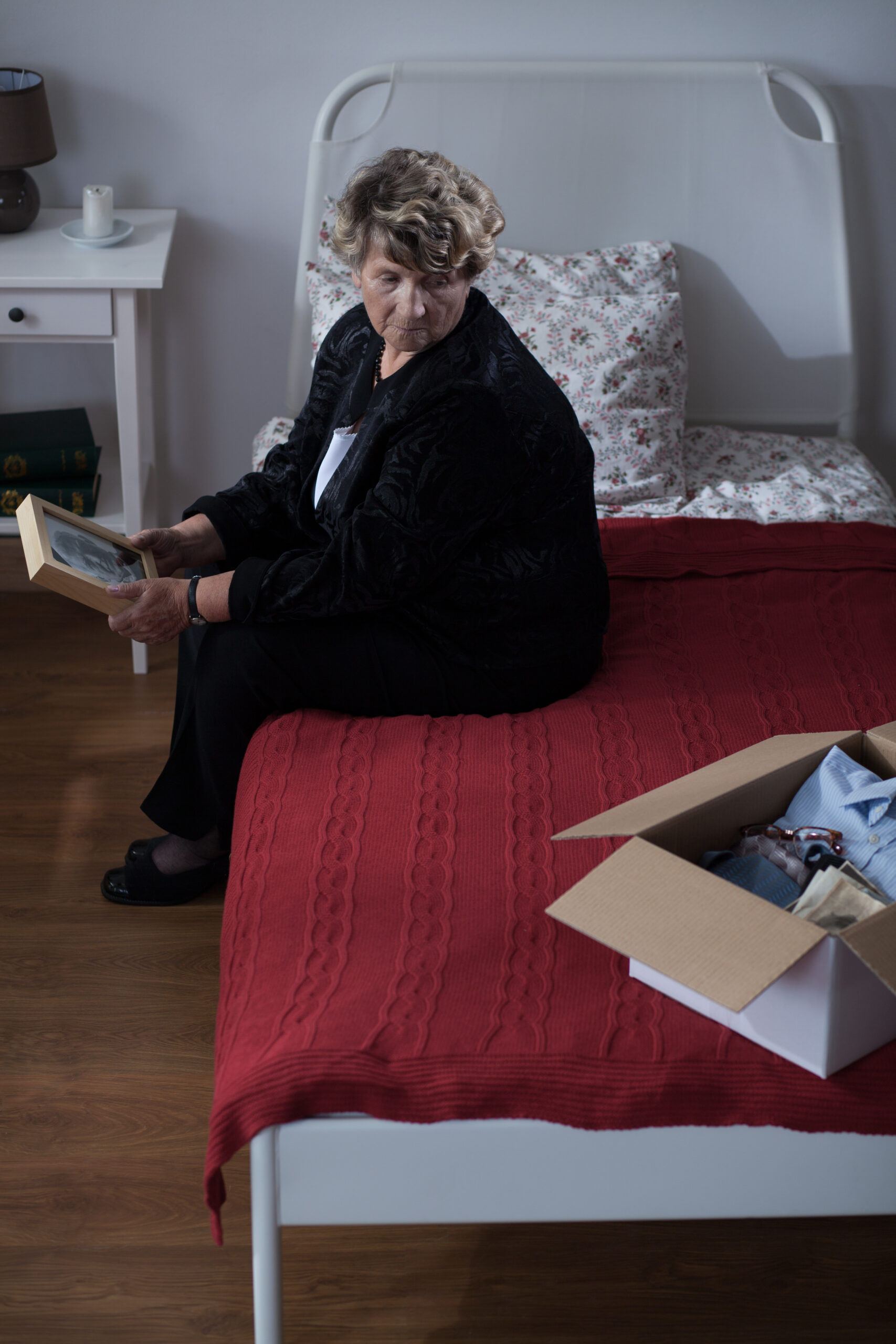 Senior woman sitting happily with a supportive caregiver, showcasing personalized care by the best Home Care Provider in Orange County, Care America Home Care.